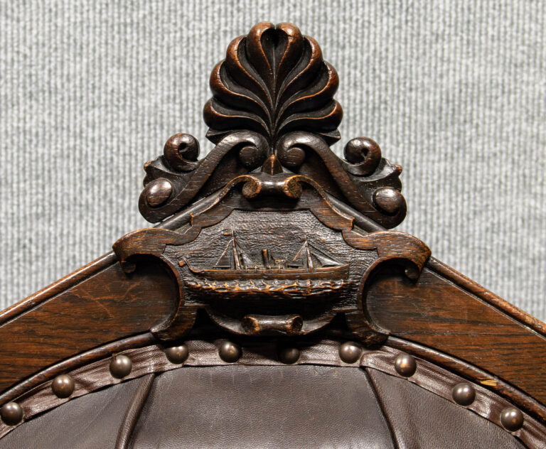 British Oak Captain’s Chair with His Carved Steam-Sail Ship
