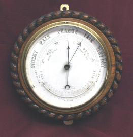 11 Inch Oak Case, Rope Twist Carved Barometer